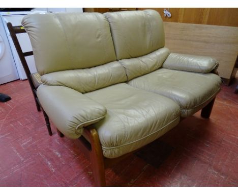 Light brown leather effect G-Plan two seater couch