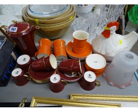 Crown Devon coffee set, three orange Carltonware mugs and a bowl etc