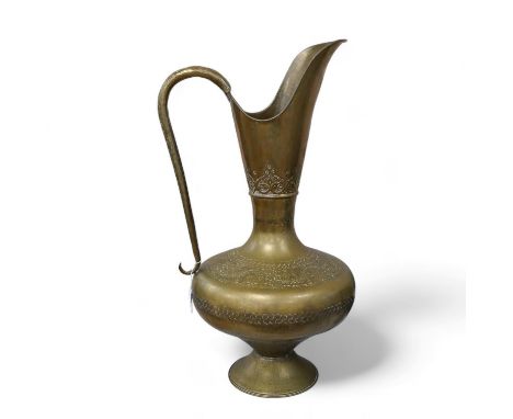 A large Indian brass ewer, 73cm tall. Condition - fair to good