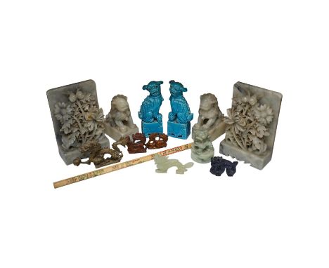 A group of Chinese items; a pair of turquoise glazed ceramic lion dogs, two pairs of soapstone carvings, various ‘dragon’ car