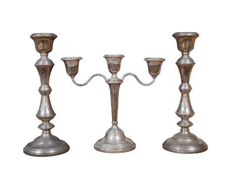 A pair of Elizabeth II silver candlesticks, Broadway &amp; Co, Birmingham, 1960, 25.7cm, weighted, together with a similar si