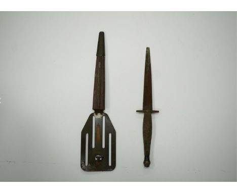 A WW2 US OSS Commando fighting knife (with broken tip), blade 14.5cm, and a spatula sheath. Condition - poor, broken tip and 