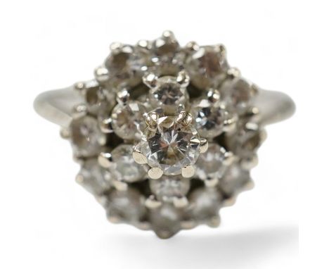 A 1970's 18ct white gold and diamond cluster set ring, size L, gross weight 3.2 grams, Condition - fair to good