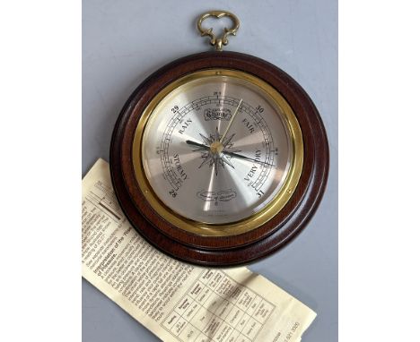 A small modern Comitti of London barometer, 16cm diameter / AN19