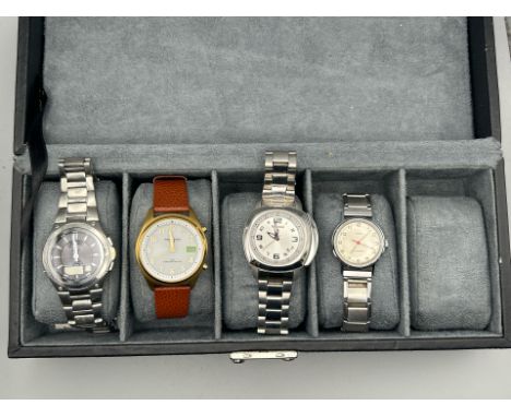 A collection of four gents watches including vintage Timex, Casio, Timberland and Precision in a five compartment watch box /