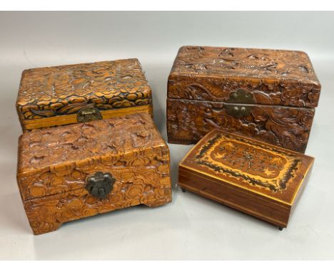 Three Chinese carved boxes, largest 25cm wide and a small inlaid musical trinket box / AN39