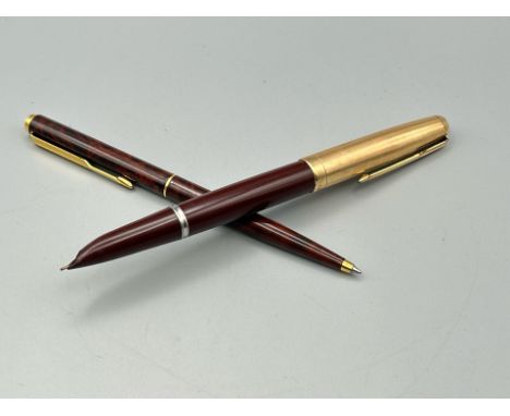 A Parker premier 14ct rolled gold fountain pen and Parker IQ ball point pen with lacquered body / AN40 