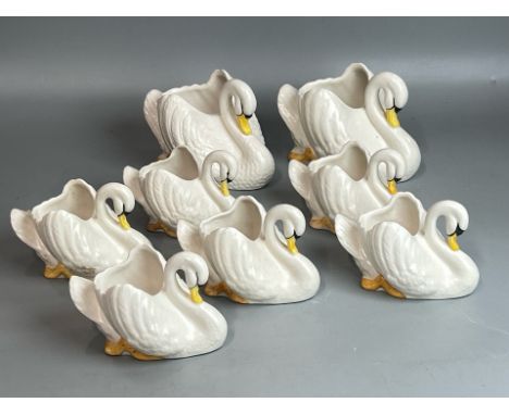 Eight ceramic Swans, two with Sylvac labels / AN24
