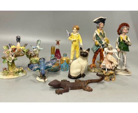 A group of figurines and miniature bottles including Royal Worcester "Parakeet", Crown Staffordshire birds, Pirate figurines 