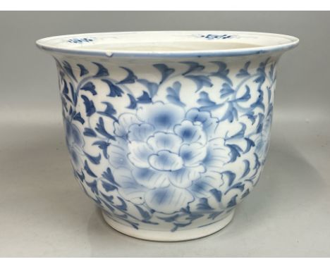 A large vintage hand painted blue and white planter decorated with peony flowers, 23.4cm high, 31cm diameter,  / AN26