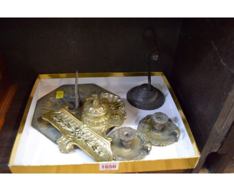 A brass inkstand; together with a pair of small chambersticks; an octagonal sundial; and a wall mounted rush light holder. 