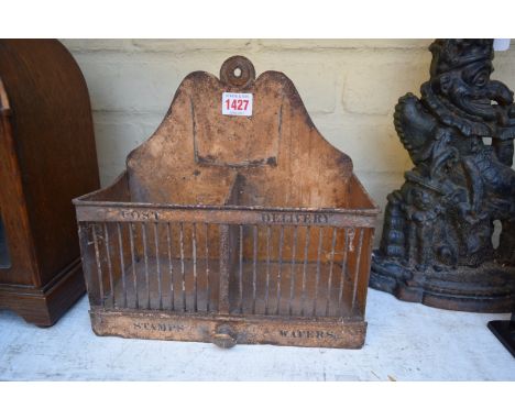 A Victorian faux grained metal hanging post box, with two divisions inscribed 'Post' and 'Delivery', the apron drawers simila