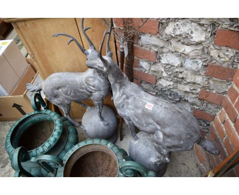 A pair of cast iron stag gate pier finials, 96.5cm high. 