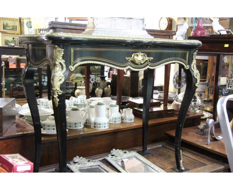 A lae 19th century, Louis XV style, ebonized and brass inlaid card table, with brass mounts, 90.5cm wide. 