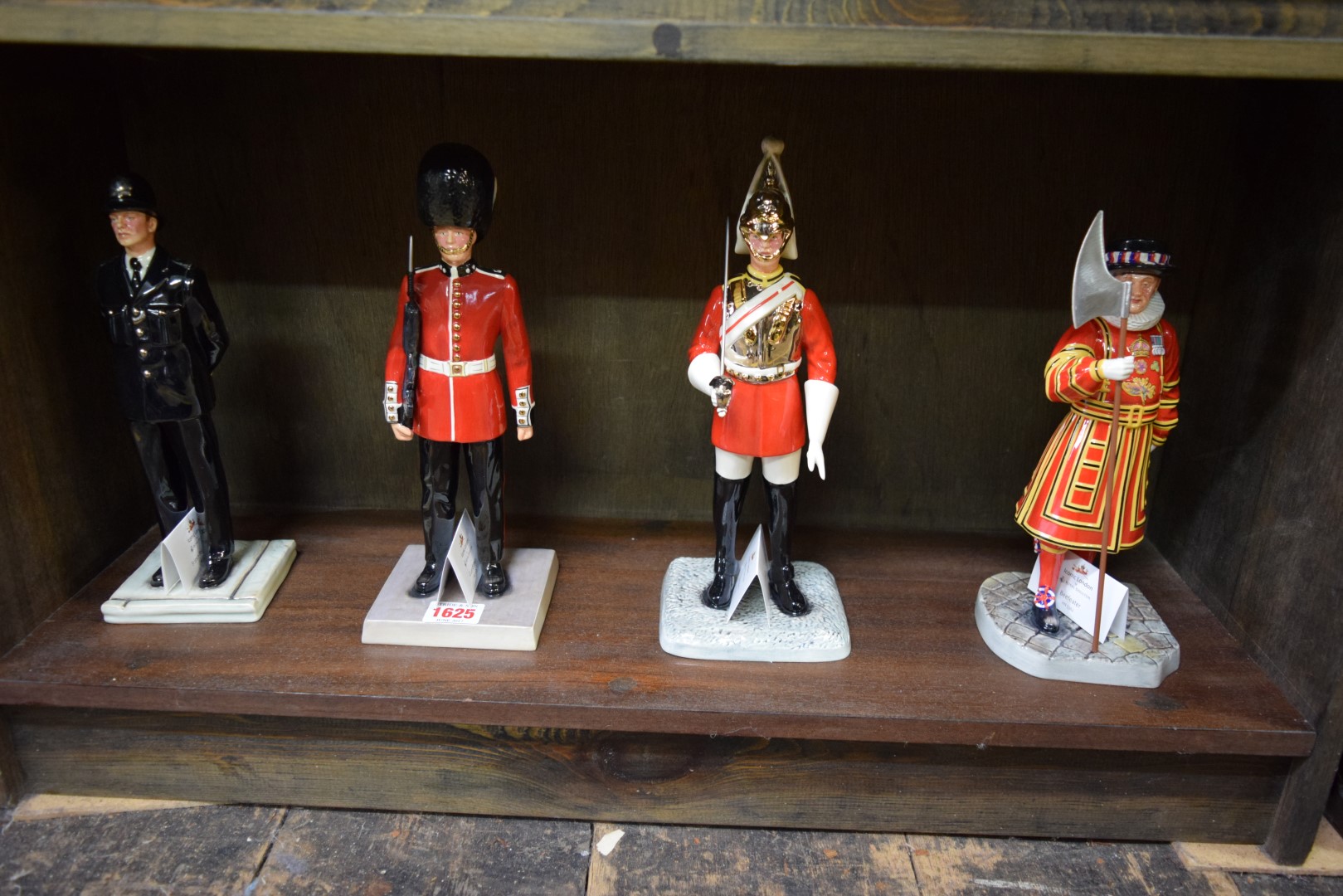 Four Royal Doulton 'Iconic London' figures, comprising 'British