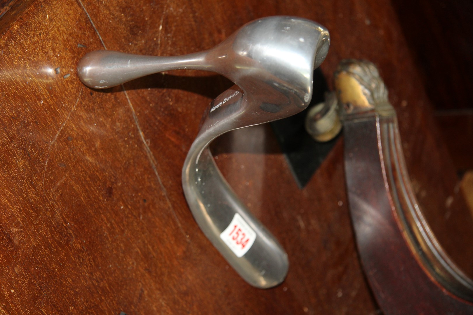 A Manolo Blahnik aluminium shoe horn.