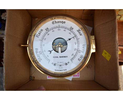 A Royal Mariner brass bulkhead style aneroid barometer, 20cm diameter. 