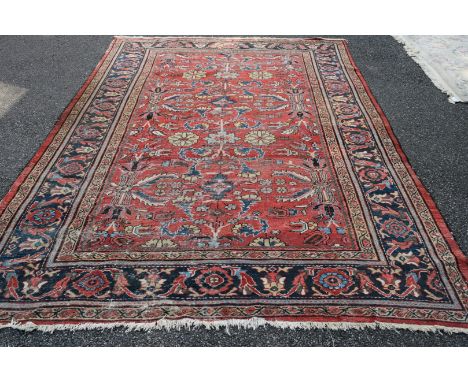 A 'Ziegler Mahal' carpet, with allover stylised floral design on a soft red madder field, 320 x 240cm.  