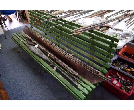 An antique green painted wrought iron bench, 184cm wide.
