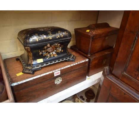 A Victorian papier-mache tea caddy, (the hinged top a.f.); together with a 19th century rosewood and shell inlaid writing slo