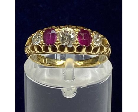 18CT GOLD RING SET WITH BAND OF THREE DIAMONDS & TWO RUBIES, size K-L, 3gmsProvenance: deceased estate Conwy