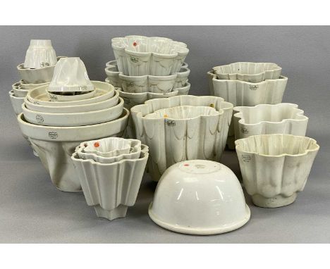 LARGE & VARIED ASSORTMENT OF CREAM CERAMIC JELLY MOULDS including ShelleyProvenance: private collection Conwy