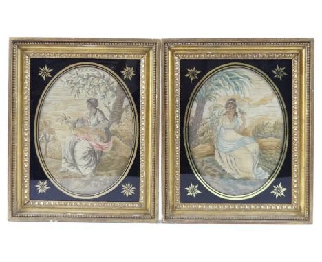 A pair of mid-19th century silk and embroidered panels, each depicting lone maiden within a landscape, framed as ovals, each 
