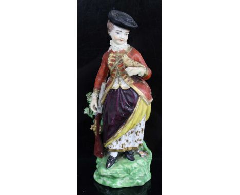 A Derby soft-paste porcelain figure, circa 1780, modelled as a huntswoman in standing pose with a bird upon her left hand and