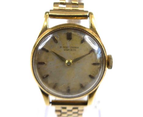 A lady's vintage International Watch Company (IWC) 18ct gold manual wind wristwatch, having a signed champagne dial with bato