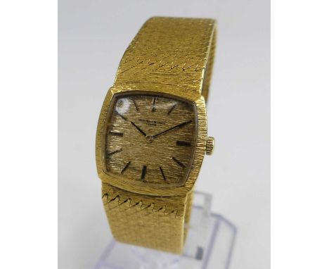 A lady's Vacheron &amp; Constantin 18ct gold cased bracelet watch, having a signed and textured arched square dial with baton