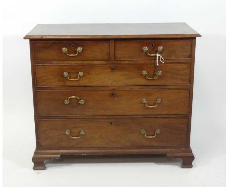 An early George III mahogany squarefront chest, of two short and three long graduated drawers, having original brass swan-nec
