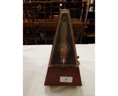 A mid-20thC oak cased metronome 