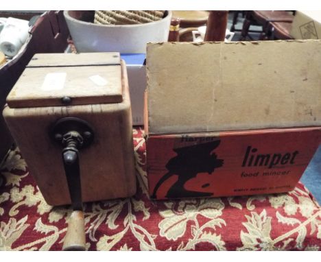 A mincer, boxed, together with a vintage wheat tester