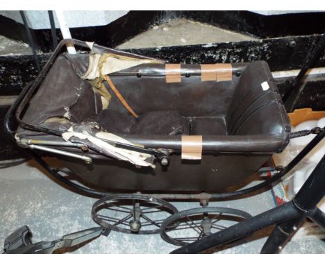 A vintage Marmaret ''The World's Lightest Baby Carriage' pram