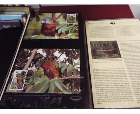 Three volumes of WWF first day covers of animals and birds of the world