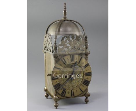 A late 19th century 17th century style brass lantern clock, with twin fusee movement, height 15in.