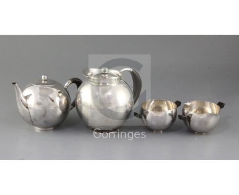A 1930's Johan Rohde for Georg Jensen four-piece planished sterling silver horn-handled tea service, design no. 533A/B, Londo