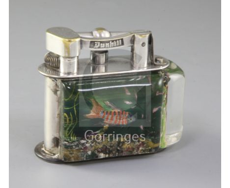 A Dunhill Aquarium lighter, with silver plated brass mounts, lacking one side panel width 3.5in. height 3in.