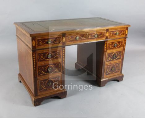 A late Victorian mahogany and marquetry pedestal writing desk, with leather inset top, fitted nine drawers, on bracket feet, 