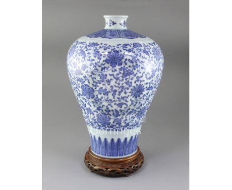 A large Chinese blue and white meiping, painted with lotus flowers and scrolling foliage in imitation of heaping and piling, 