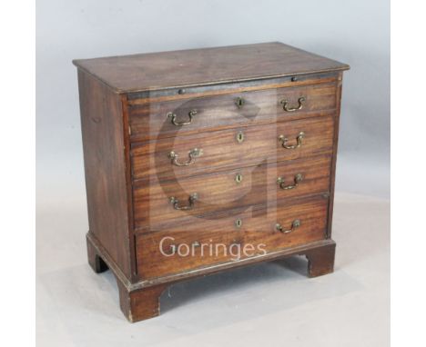 A George III mahogany chest, fitted brushing slide and four graduated long drawers on bracket feet, W.2ft 9in. D.1ft 8in. H.2