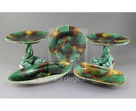 A Victorian Wedgwood fourteen piece Majolica dessert service, moulded with scallop shells with tortoiseshell glaze including 