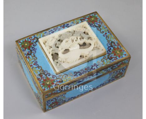 A 19th century Chinese rectangular cloisonne enamel box, mounted with a 17th/18th century white jade plaque, the plaque carve