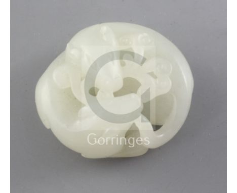 A Chinese white jade carving of two badgers biting a sprig on lingzhi, the stone of a good even tone with a hint of grey, 3.9