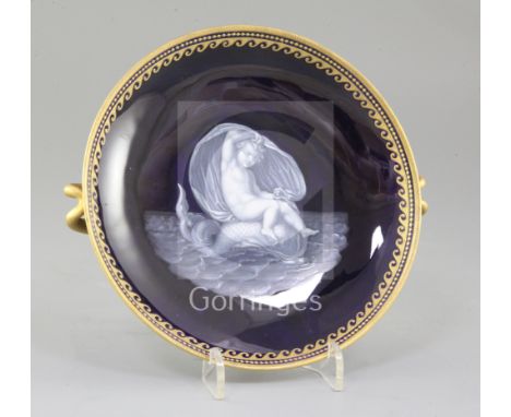 A Kerr &amp; Binns Worcester `Limoges Enamel` dish by Thomas Bott, late 19th century, painted with a cherub riding a dolphin,
