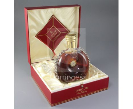 A bottle of Rémy Martin Louis XIII Grande champagne cognac, in Baccarat crystal decanter, initialled AB8810, unopened with st