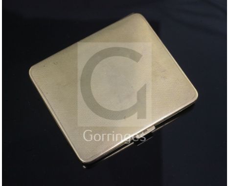 A 1920's engine turned 9ct. gold cigarette case, 80mm.