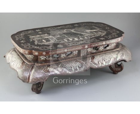 A Chinese Ryuku Islands lacquer and mother of pearl small Kang table, 17th/18th century, the top and sides decorated with fig