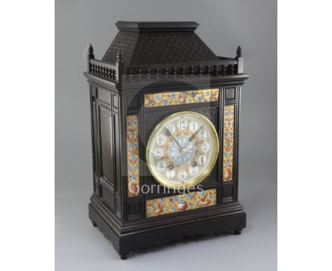 An Aesthetic movement ebonised architectural mantel clock, c.1885, the French movement striking on a gong, with Arabic numera