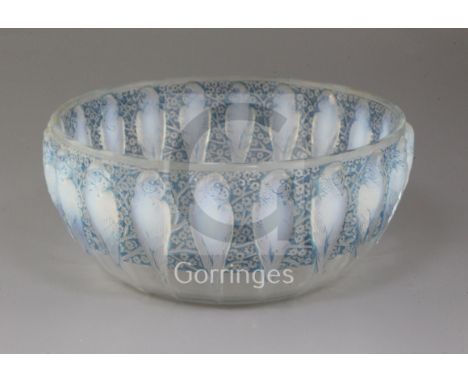 A Rene Lalique Perruches pattern opalescent bowl (coupe), model 419, design c.1931, with blue staining, etched mark R. LALIQU